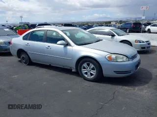 2013 Chevrolet Impala LS with VIN 2G1WF5E31D1132793, listed as a IAAI auction lot 41938975 with 176,492 mi miles and . Bid and sale history available at DreamBid. Image 1.