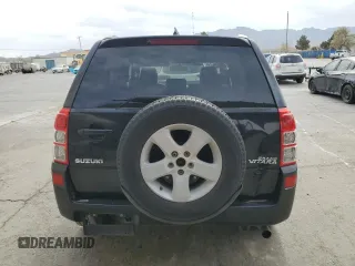 2009 Suzuki Grand Vitara with VIN JS3TE044094100649, listed as a Copart auction lot 52033855 with 137,460 mi miles and Salvage title. Bid and sale history available at DreamBid. Image 6.
