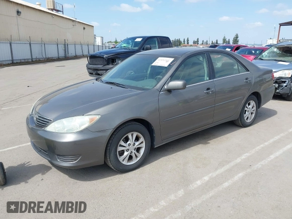 2005 Toyota Camry LE with VIN 4T1BF32K35U590150, listed as a IAAI auction lot 42053337 with 180,627 mi miles and . Bid and sale history available at DreamBid. Image 2.
