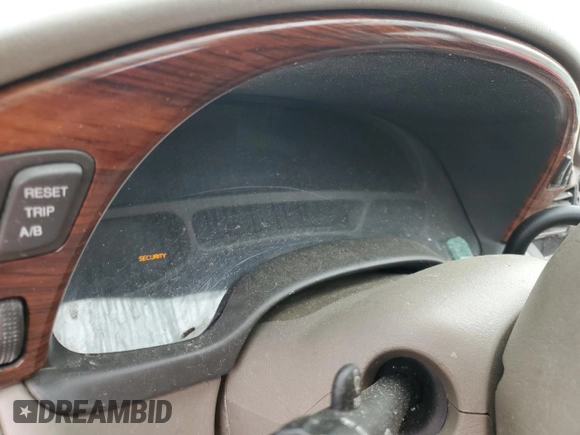 2004 Cadillac DeVille z VIN 1G6KD54Y24U186197, wystawiony jako Copart lot #54191045 z przebiegiem Nie podano mil oraz Szkody całkowita. Historia ofert i sprzedaży dostępna na DreamBid. Obrazek 9.