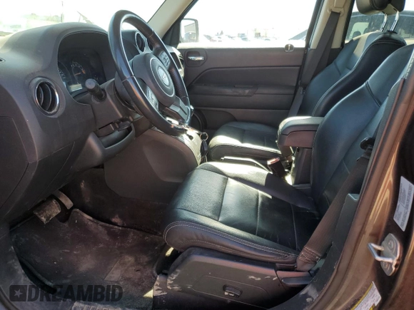 2015 Jeep Patriot High Altitude with VIN 1C4NJRAB7FD311725, listed as a Copart auction lot 55309675 with 185,560 mi miles and Salvage Title. Bid and sale history available at carsss.com. Image 7.