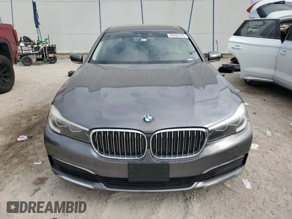 2019 BMW 7 Series 740i z VIN WBA7E2C50KB454532, wystawiony jako Copart lot #89005785 z przebiegiem 93 921 mil mil oraz Czysty tytuł • Clean title. Historia ofert i sprzedaży dostępna na DreamBid. Obrazek 5.