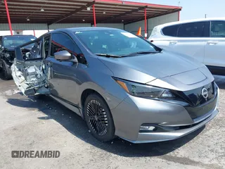 2023 Nissan LEAF SV Plus z VIN 1N4CZ1CV1PC561824, wystawiony jako IAAI lot #42049652 z przebiegiem 8 893 mil mil oraz . Historia ofert i sprzedaży dostępna na DreamBid. Obrazek 1.