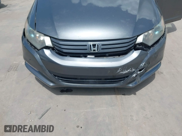 2010 Honda Insight EX with VIN JHMZE2H74AS040110, listed as a IAAI auction lot 42643669 with 189,531 mi miles and . Bid and sale history available at DreamBid. Image 6.