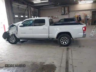 2016 Toyota Tacoma SR5 with VIN 3TMDZ5BN2GM007990, listed as a IAAI auction lot 41288736 with 76,179 mi miles. Bid and sale history available at carsss.com. Image 14.