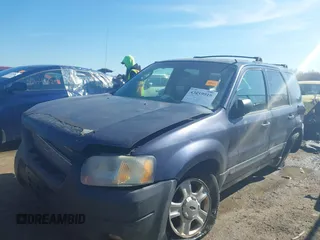 2003 Ford Escape XLT Popular with VIN 1FMYU03103KD07779, listed as a IAAI auction lot 42019919 with 245,522 mi miles. Bid and sale history available at carsss.com. Image 2.