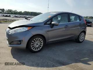 2014 Ford Fiesta Titanium z VIN 3FADP4FJ3EM191525, wystawiony jako Copart lot #57314175 z przebiegiem 171 626 mil mil oraz Szkoda całkowita • Salvage title. Historia ofert i sprzedaży dostępna na DreamBid. Obrazek 1.
