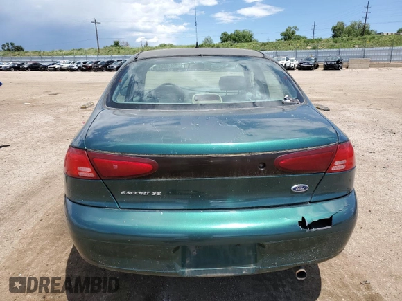 2000 Ford Escort with VIN 3FAFP13P6YR167405, listed as a Copart auction lot 60447535 with 128,413 mi miles and Clean title. Bid and sale history available at DreamBid. Image 6.