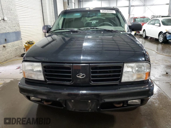 2001 Oldsmobile Bravada z VIN 1GHDT13W912194316, wystawiony jako Copart lot #49438485 z przebiegiem 124 380 mil mil oraz Szkody całkowita. Historia ofert i sprzedaży dostępna na DreamBid. Obrazek 5.