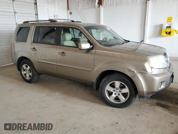 2011 Honda Pilot EX-L with VIN 5FNYF4H55BB010648, listed as a Copart auction lot 51094675 with 213,392 mi miles and Salvage Title. Bid and sale history available at DreamBid. Image 4.