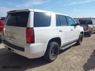 2018 Chevrolet Tahoe Commercial with VIN 1GNLCDEC0JR283440, listed as a IAAI auction lot 41280493 with 241,531 mi miles. Bid and sale history available at carsss.com. Image 4.