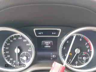 2014 Mercedes-Benz GL 450 with VIN 4JGDF7CE0EA372225, listed as a IAAI auction lot 42141012 with 158,045 mi miles and . Bid and sale history available at DreamBid. Image 7.