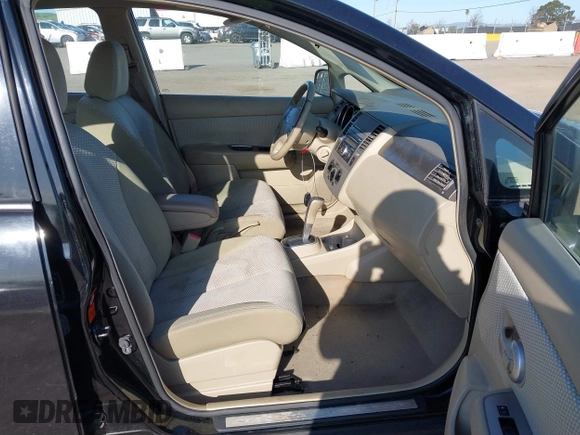 2009 Nissan Versa 1.8 SL with VIN 3N1BC13E79L406521, listed as a IAAI auction lot 41778840 with 93,070 mi miles. Bid and sale history available at carsss.com. Image 5.
