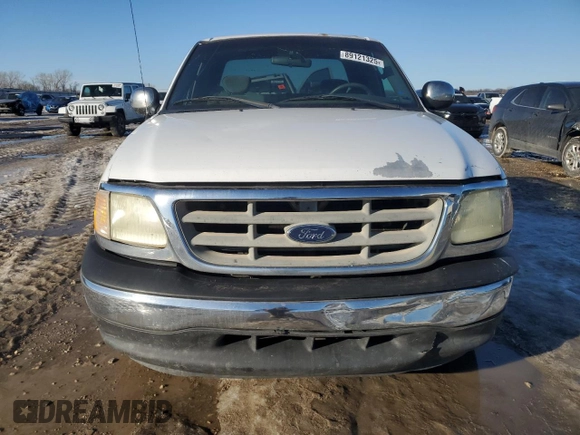 2002 Ford F-150 XL with VIN 1FTRX17L42KD35973, listed as a Copart auction lot 89121325 with 258,895 mi miles and Salvage title. Bid and sale history available at DreamBid. Image 5.