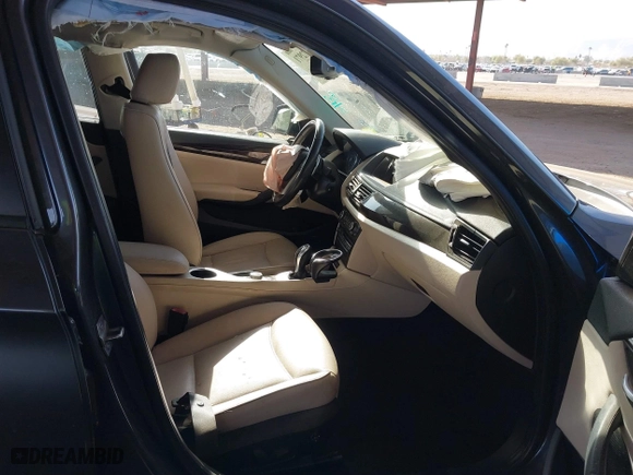 2013 BMW X1 28i with VIN WBAVM1C57DVW42096, listed as a IAAI auction lot 41572971 with 156,999 mi miles. Bid and sale history available at carsss.com. Image 5.