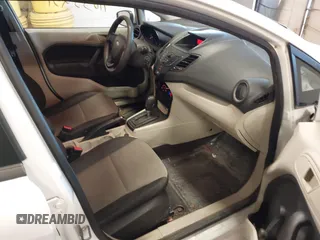 2012 Ford Fiesta S with VIN 3FADP4AJ9CM140647, listed as a IAAI auction lot 41633251 with 117,309 mi miles. Bid and sale history available at carsss.com. Image 5.