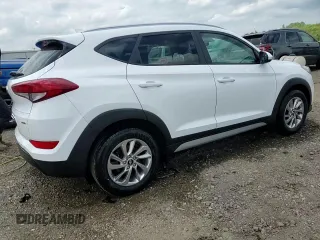 2018 Hyundai Tucson SEL z VIN KM8J3CA4XJU695477, wystawiony jako Copart lot #56494875 z przebiegiem 79 122 mil mil oraz Szkoda całkowita • Salvage title. Historia ofert i sprzedaży dostępna na DreamBid. Obrazek 14.