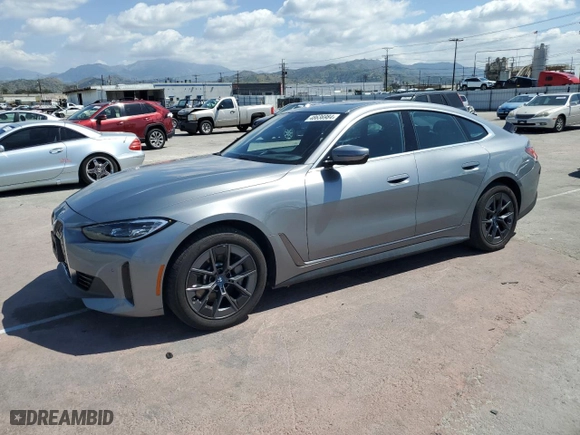 2023 BMW i4 eDrive40 with VIN WBY73AW02PFN60384, listed as a Copart auction lot 48636984 with 13,504 mi miles. Bid and sale history available at carsss.com. Image 1.