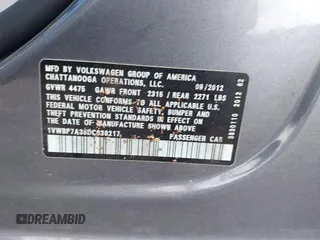 2013 Volkswagen Passat SE w/Sunroof & Nav with VIN 1VWBP7A35DC038217, listed as a IAAI auction lot 41944193 with 102,767 mi miles. Bid and sale history available at carsss.com. Image 9.