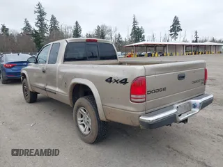 2004 Dodge Dakota SLT with VIN 1D7HG42N44S525545, listed as a IAAI auction lot 41739083 with 266,353 mi miles. Bid and sale history available at carsss.com. Image 3.