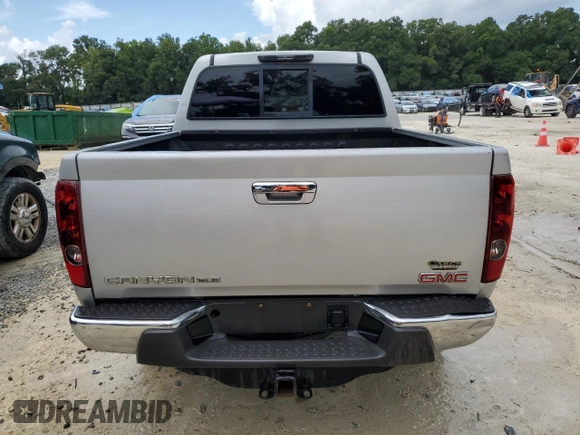 2012 GMC Canyon with VIN 1GTH5PFE3C8167202, listed as a Copart auction lot 64867274 with 238,153 mi miles and Salvage title. Bid and sale history available at DreamBid. Image 6.