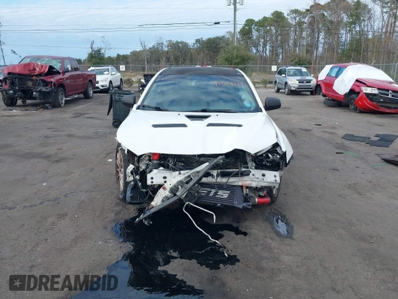 2011 Mitsubishi Lancer Evolution GSR with VIN JA32W8FV9BU045781, listed as a IAAI auction lot 41308314 with 102,840 mi miles. Bid and sale history available at carsss.com. Image 13.