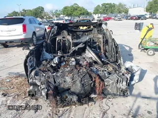 2022 Tesla Model S Plaid z VIN 5YJSA1E64NF477659, wystawiony jako IAAI lot #42358072 z przebiegiem Nie podano mil oraz . Historia ofert i sprzedaży dostępna na DreamBid. Obrazek 11.