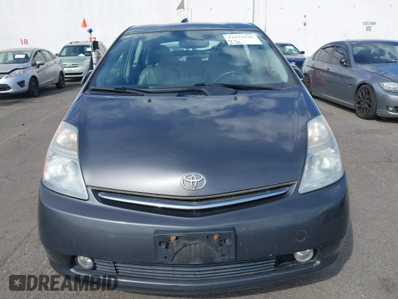 2006 Toyota Prius with VIN JTDKB20UX63190303, listed as a IAAI auction lot 41871826 with 147,124 mi miles. Bid and sale history available at carsss.com. Image 6.