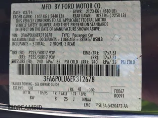 2014 Ford Fusion SE Hybrid with VIN 3FA6P0LU6ER312678, listed as a IAAI auction lot 42140117 with 103,154 mi miles. Bid and sale history available at carsss.com. Image 9.