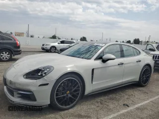 2018 Porsche Panamera z VIN WP0AA2A7XJL116637, wystawiony jako Copart lot #59530715 z przebiegiem 51 598 mil mil oraz Szkoda całkowita • Salvage title. Historia ofert i sprzedaży dostępna na DreamBid. Obrazek 1.