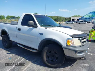 1997 Ford F-150 with VIN 1FTDF18W5VKD72475, listed as a IAAI auction lot 42382038 with 101,891 mi miles and . Bid and sale history available at DreamBid. Image 1.