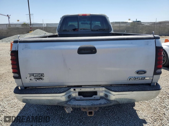 2001 Ford F-150 XL with VIN 1FTRX17W11NA24623, listed as a Copart auction lot 56767345 with 201,959 mi miles and Salvage title. Bid and sale history available at DreamBid. Image 6.