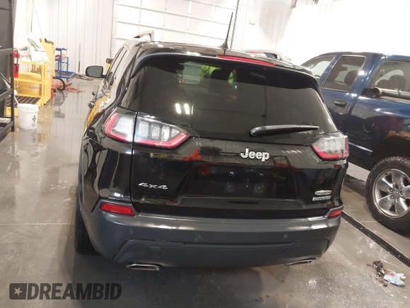 2021 Jeep Cherokee Latitude Lux with VIN 1C4PJMMX2MD107902, listed as a IAAI auction lot 41229913 with 61,195 mi miles and . Bid and sale history available at DreamBid. Image 16.