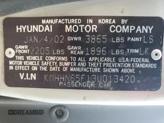 2003 Hyundai Tiburon GT z VIN KMHHN65F13U013420, wystawiony jako Copart lot #51234495 z przebiegiem 230 612 mil mil oraz Szkoda całkowita • Salvage title. Historia ofert i sprzedaży dostępna na DreamBid. Obrazek 14.
