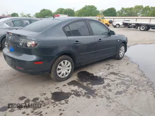 2009 Mazda 3 i Touring Value with VIN JM1BK32F291235335, listed as a IAAI auction lot 41880603 with 144,358 mi miles and . Bid and sale history available at DreamBid. Image 4.