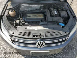 2012 Volkswagen Tiguan SE z VIN WVGAV7AX5CW004889, wystawiony jako Copart lot #57346115 z przebiegiem 100 503 mil mil oraz Szkoda całkowita • Salvage title. Historia ofert i sprzedaży dostępna na DreamBid. Obrazek 12.