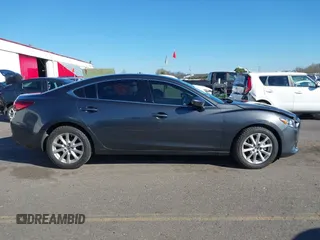 2016 Mazda 6 i Sport with VIN JM1GJ1U53G1400940, listed as a IAAI auction lot 41687400 with 77,737 mi miles and . Bid and sale history available at DreamBid. Image 13.