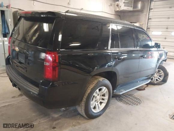 2017 Chevrolet Tahoe LT with VIN 1GNSKBKC6HR257149, listed as a IAAI auction lot 41855447 with 176,449 mi miles. Bid and sale history available at carsss.com. Image 4.