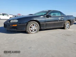 2002 Chevrolet Camaro z VIN 2G1FP22K722132425, wystawiony jako Copart lot #46666165 z przebiegiem 214 580 mil mil oraz Czysty tytuł • Clean title. Historia ofert i sprzedaży dostępna na DreamBid. Obrazek 1.