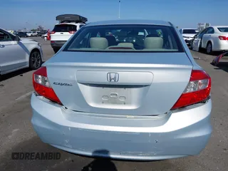 2012 Honda Civic LX with VIN 2HGFB2F58CH560126, listed as a IAAI auction lot 42097094 with 149,921 mi miles and . Bid and sale history available at DreamBid. Image 16.