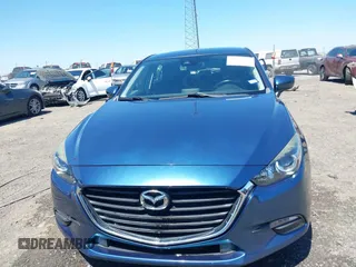2018 Mazda 3 Touring z VIN 3MZBN1L38JM185142, wystawiony jako IAAI lot #42004450 z przebiegiem 172 096 mil mil oraz . Historia ofert i sprzedaży dostępna na DreamBid. Obrazek 12.