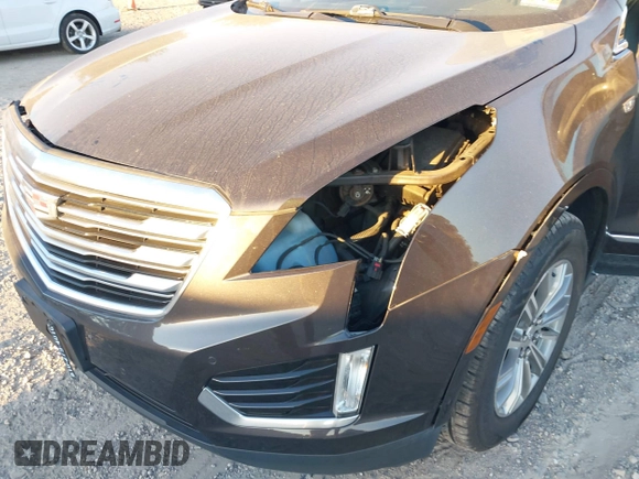 2017 Cadillac XT5 Luxury AWD with VIN 1GYKNDRS5HZ319787, listed as a IAAI auction lot 40819077 with 83,510 mi miles and . Bid and sale history available at DreamBid. Image 17.