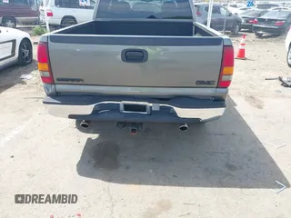 1999 GMC New Sierra 1500 SLE with VIN 2GTEK19T4X1515262, listed as a IAAI auction lot 41985162 with 344,021 mi miles. Bid and sale history available at carsss.com. Image 6.
