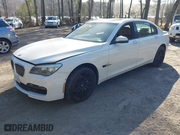 2014 BMW 7 Series 740Li with VIN WBAYE4C59ED138409, listed as a IAAI auction lot 41785423 with 121,687 mi miles. Bid and sale history available at carsss.com. Image 17.