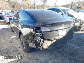 2022 Tesla Model 3 with VIN 5YJ3E1EA9NF147836, listed as a IAAI auction lot 41363603 with 28,748 mi miles. Bid and sale history available at carsss.com. Image 3.