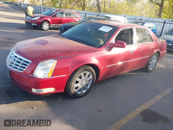 2006 Cadillac DTS 1SC z VIN 1G6KD57Y36U203703, wystawiony jako IAAI lot #42083564 z przebiegiem 183 549 mil mil oraz . Historia ofert i sprzedaży dostępna na DreamBid. Obrazek 2.