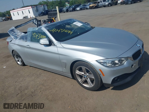 2014 BMW 4 Series 428i with VIN WBA3V7C55EJ873028, listed as a IAAI auction lot 42432699 with 24,063 mi miles and . Bid and sale history available at DreamBid. Image 1.
