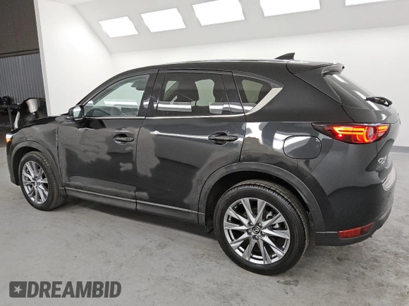 2021 Mazda CX-5 Grand Touring with VIN JM3KFBDM6M0487606, listed as a Copart auction lot 45399655 with 25,241 mi miles and Clean Title. Bid and sale history available at DreamBid. Image 2.