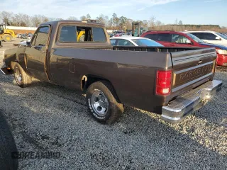 1988 Dodge D/W 100 with VIN 1B7FD04XXJS678038, listed as a Copart auction lot 84737964 with 19,276 mi miles and Salvage Title. Bid and sale history available at carsss.com. Image 2.