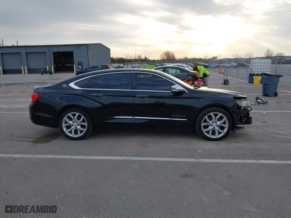 2014 Chevrolet Impala LTZ with VIN 2G1155S31E9211885, listed as a IAAI auction lot 41804249 with 149,066 mi miles. Bid and sale history available at carsss.com. Image 14.